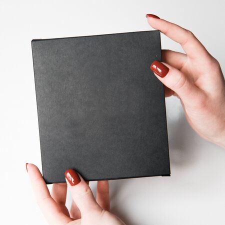 Gift box without labels. Black business card for a set of brushes. の写真素材