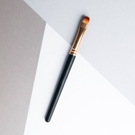Leather case with makeup brushes. Set of black eyebrow brushes. の写真素材