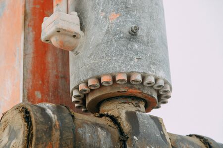 Details of the broken mechanism and peeling paint. The texture of old rusty metal and rubber.の写真素材