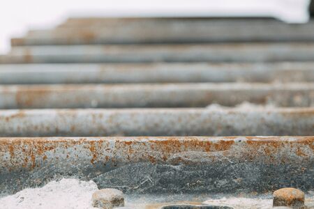 The texture of old rusty metal. Details of the broken mechanism and peeling paint.の写真素材