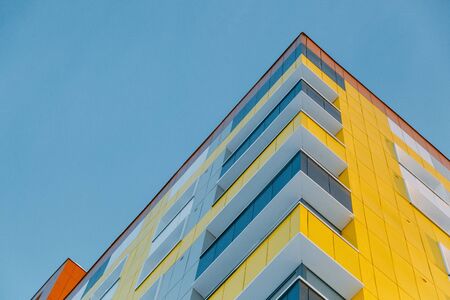 Parts of the facades of modern houses. Bright juicy colors in the construction of buildings.の写真素材