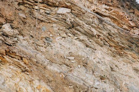 The texture of stones and minerals, in the context of the earth. Stone background for design.の写真素材