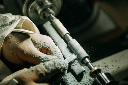 Turning and grinding of blanks. Shop with machines for wood processing.
