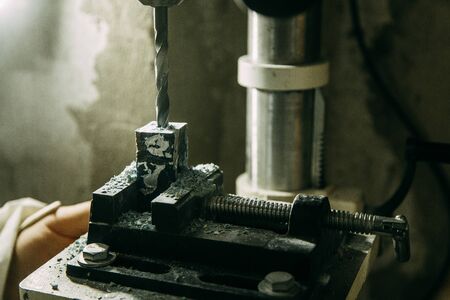 Drilling holes on wood parts. Shop with machines for wood processing.