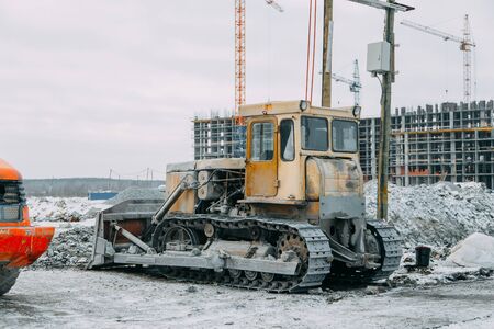Construction equipment for the construction of buildings and road works. Bulldozer and tractorの写真素材