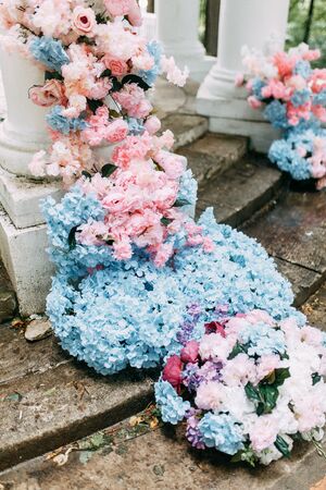 Intimate parts of the body, the atmosphere of the occasion. Wedding shoes, dress details and hands.の写真素材