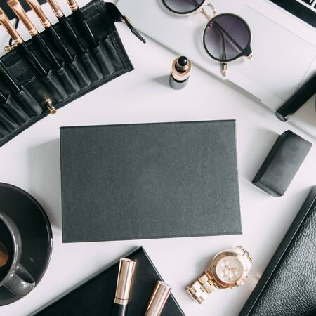 Workplace blogger, makeup artist and eyebrow. Flatley layout with boxes and brushes. Expensive tools and cosmetics.の写真素材