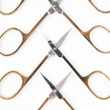 Makeup artist and eyebrow tools. Scissors, forceps and mask. Cut out the background and Flatley.