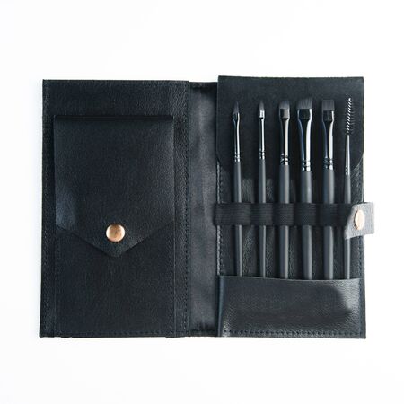 Brush brow and makeup artist in the set. Cut Bon and minimalism. Set of brushes and Flatley....