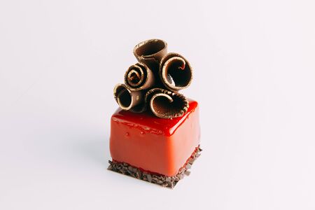 Berry Cakes on a black stone background, author's desserts and serving. Chocolate, berries and cream. The design for the websiteの写真素材
