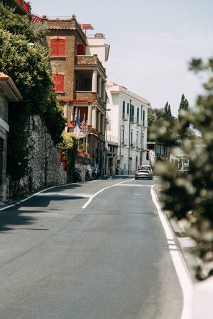 Views of the city of Sorrento in Italy, panorama and top view. Night and day, the streets and the coast. Beautiful landscape and brick roofs. Architecture and monuments of antiquity. Shops and streets with fountains and sculptures.の写真素材