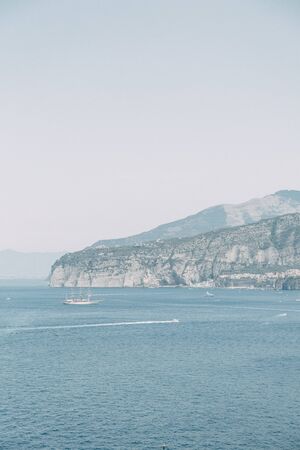 Views of the city of Sorrento in Italy, panorama and top view. Night and day, the streets and the coast. Beautiful landscape and brick roofs. Architecture and monuments of antiquity. Shops and streets with fountains and sculptures.の写真素材