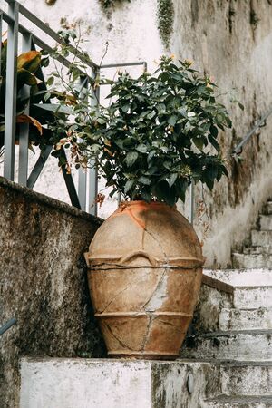 Amalfi coast in Italy, the most beautiful city. Streets and old architecture, narrow passages, shops and cafes. View from the sea and above. Panoramic view of the mountain slopesの写真素材