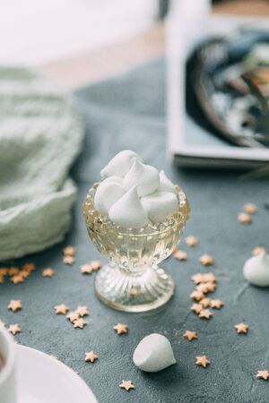 Coffee with mint on a wooden table. Food styling and desserts with flowers.の写真素材