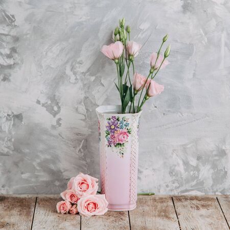 Souvenirs made of porcelain shot in the Studio with marshmallows and flowers. DIY and gift setsの写真素材