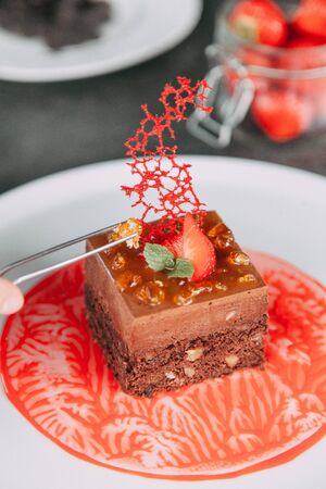 cooking a cake with strawberries and chocolateの写真素材