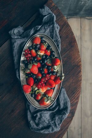 Composition of berries of blueberry and strawberryの写真素材