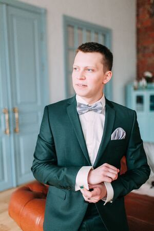 the European-style wedding, a handsome couple in a photo Studio, bride's morningの写真素材