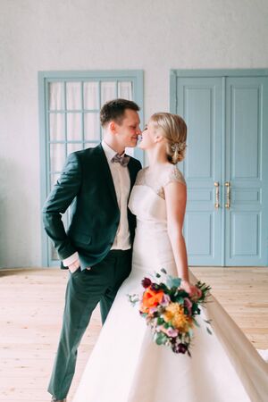 the European-style wedding, a handsome couple in a photo Studio, bride's morningの写真素材