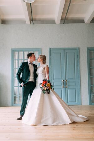 the European-style wedding, a handsome couple in a photo Studio, bride's morningの写真素材