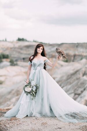 bride with owls and printing, the bride's bouquet and the sunsetの写真素材