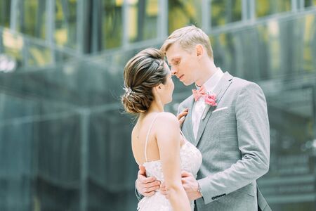 Stylish wedding in St. Petersburg. Walking photo shoot in the city. European style of architectureの写真素材