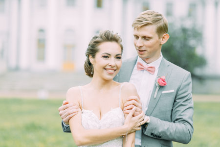 Stylish wedding in St. Petersburg. Elagin island and castle in the background. Walking photo session of the couple.のeditorial素材