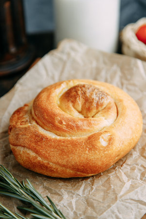 Swirling round pie close-up. Traditional Moldovan and Romanian cake in the shape of a snail.の写真素材
