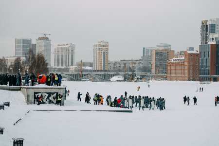 Yekaterinburg, Russia - january 23, 2021: Protests against Putin and for Navalny. People were driven to the frozen river on the ice in winter.のeditorial素材