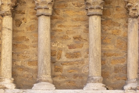 Ancient stone wall of a church buildingの写真素材