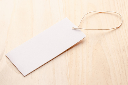 The price tag on the background of the old wooden tableの写真素材