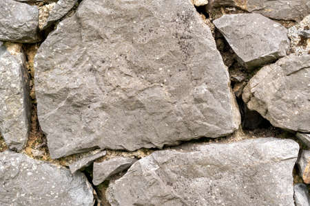 Stone wall texture abstract close up. Natural background