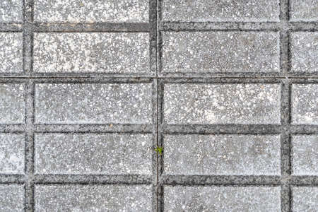 Geometric pattern of road tiles close up. Abstract background. Texture. Copy spaceの写真素材