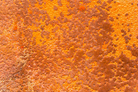 Textured rusty surface close-up. Abstract spotted background