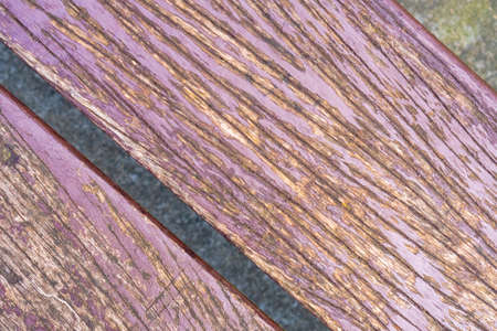 Cracked weathered texture of a wooden bench close upの写真素材
