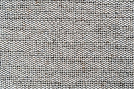 Jute rough woven gray mat texture. Macro. Rustic fabric background