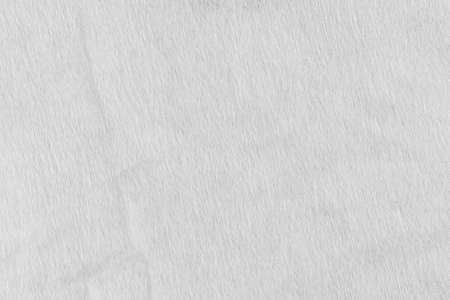 White paper weathered grunge texture. Crumpled wrinkled gray textured surface