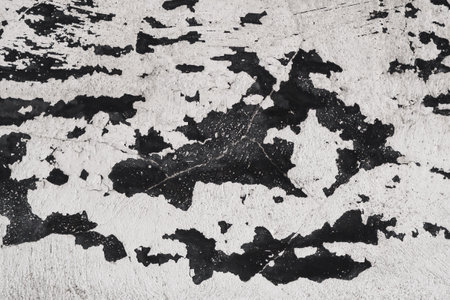 Distressed wall texture of peeled cracked paint. abstract grunge background