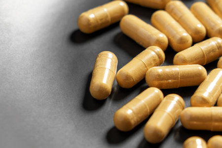 Ashwagandha capsules for enhanced stress relief and improved overall health in grey bowl. Macro
