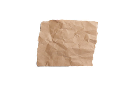 Piece of crumpled brown packing paper isolated on white backgroundの写真素材