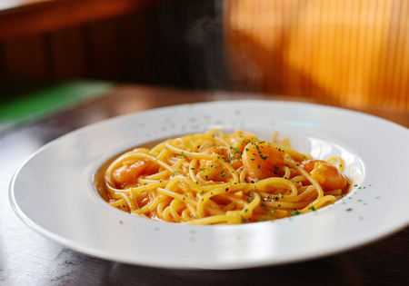 Stir fried spicy spaghetti with shrimpの写真素材