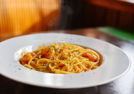 Stir fried spicy spaghetti with shrimpの写真素材