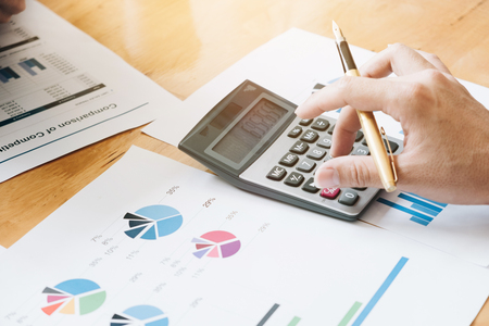 Hand using calculating, Professional investor and financial working in office ,Business marketing conceptの写真素材