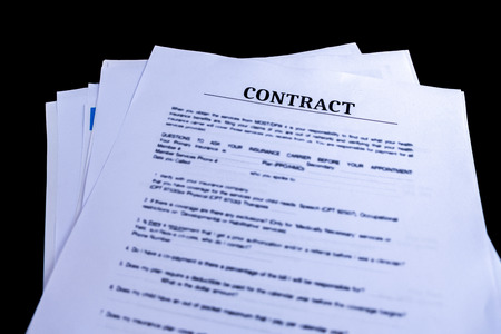 Legal Contract Agreement Documents Papers with black background and top view, Business and Office concept.の写真素材