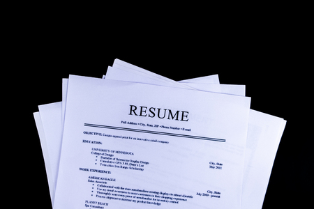Resume Documents Papers with black background and top view, Business and Office concept.の写真素材