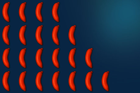Classic blue food pattern of painted orange bananas.の写真素材