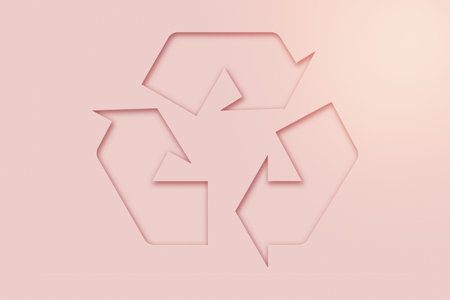 Pink reuse logo cut out of paper.の写真素材