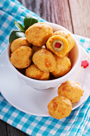 Italian Appetizer Olives baked in cheddar doughの写真素材