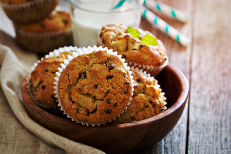 Gluten free almond and oat muffins with apple and chocolate chipsの写真素材