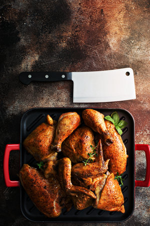 Grilled chicken in a grill pan with copy space overhead viewの写真素材
